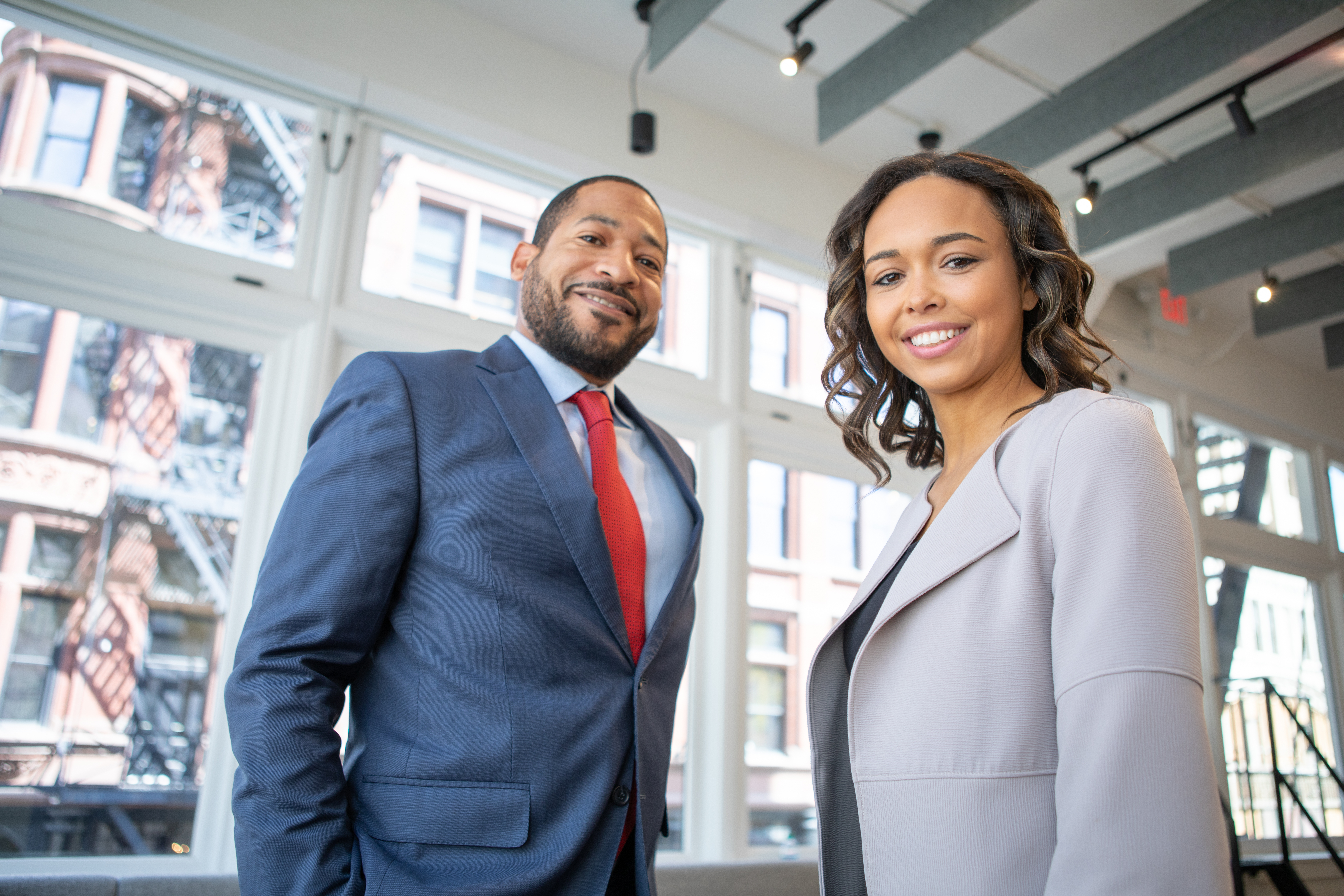 Canva - Man and Woman Smiling Inside Building.jpg